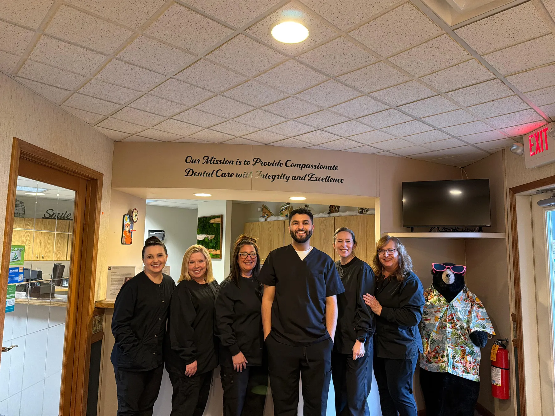 Dr. Al-Jerdi and the Riverside Family Dentistry team in the Temperance office